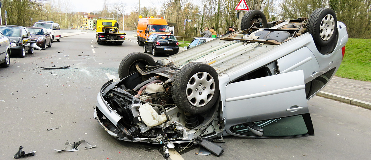 automobile accident with overturned car